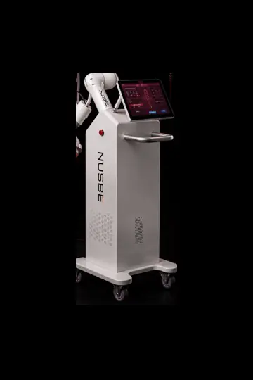 White NUSBE robotic system beside an operator display with a temperature-monitoring graph